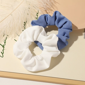 Set of 2 ribbed texture scrunchies in blue and white colors for summer hair styling