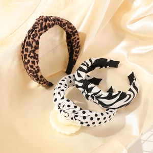 Three-piece headband set featuring leopard, zebra, and polka dot patterns on satin fabric