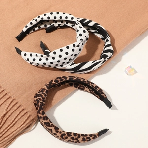 Three-piece retro headband set with leopard, zebra, and polka dot patterns in soft fabric