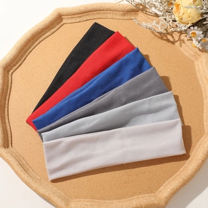 Set of six colorful elastic yoga headbands in flat knit fabric for sports and fitness