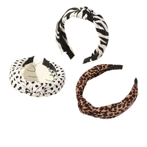 Three-piece knotted headband set featuring leopard, zebra, and polka dot patterns
