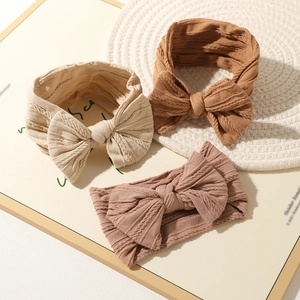 Set di 3 fasce per neonati in maglia jacquard con grandi fiocchi in beige, marrone e rosa