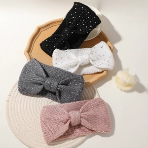 Knitted ear warmer headband with rhinestone bow design in black, white, grey and pink colors