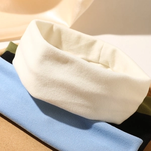 Detailed close-up of colorful non-slip elastic yoga headbands in soft knit fabric