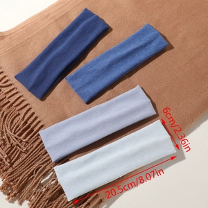 Detail showing set of four blue elastic knitted headbands with specific size dimensions
