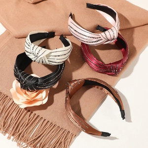 Five-piece set of knotted satin headbands with rhinestones in assorted retro colors