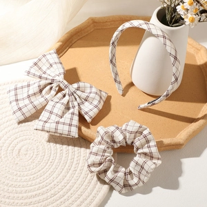 Vintage brown plaid hair accessories set including bow clip, headband, and scrunchie