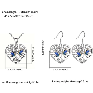 Détails du coffret bijoux cœur arbre de vie et boucles d'oreilles papillon bleu