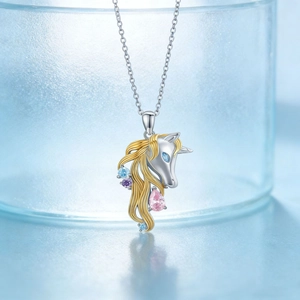 Cute silver and gold unicorn necklace with colorful gemstones and dainty chain link