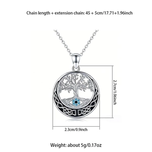 Detailed view of Tree of Life pendant with evil eye and Celtic knot patterns