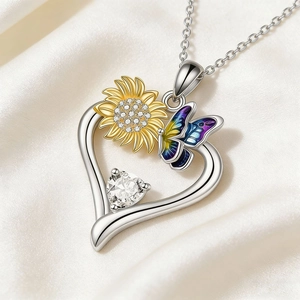 Zilveren hart zonnebloem ketting met kleurrijke vlinder en grote hartvormige edelsteen