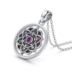 Rotating lotus pendant necklace with colorful gems and purple center stone on silver chain