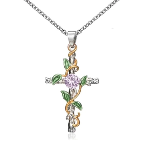 Collier croix avec vignes dorées feuilles vertes et gemme rose sur chaîne argent