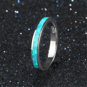 Minimalist S925 silver ring with vibrant blue opal inlay for elegant engagement weddings