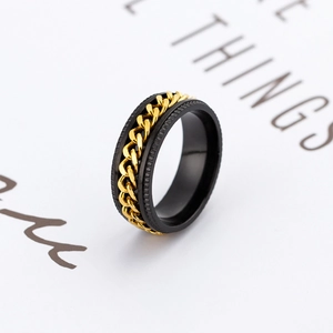 Men's black rotatable stainless steel ring with golden Cuban chain inlay and gear edges