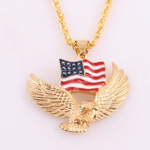 Detail of golden American eagle pendant with US flag enamel on a rope chain necklace
