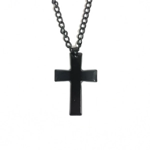 Detail of matte black stainless steel cross pendant and round link chain for men