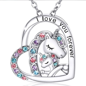 Detail of silver unicorn heart pendant with colorful stones and I love you forever engraving
