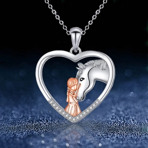 Silver and rose gold heart necklace featuring a girl and horse pendant with white zircons