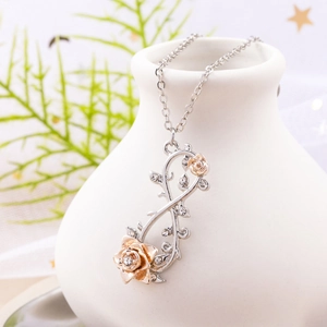 Elegant rose vine infinity pendant necklace with gold flowers and white zircon stones