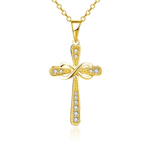 Collier croix infini doré avec des pierres de cristal blanc sur un fond blanc épuré