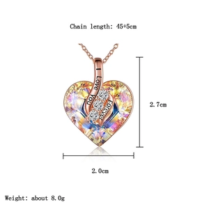Iridescent heart crystal necklace detail with I Love You engraving and size specs