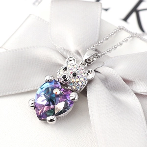 Sparkling teddy bear pendant necklace with heart crystal on elegant white gift box