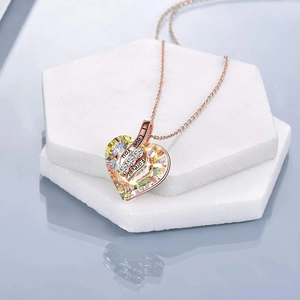 Iridescent heart crystal necklace in rose gold with I Love You Forever engraving