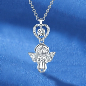 Sparkling angel heart necklace with crystal accents on a premium blue silk background