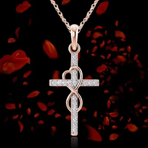 Detail of rose gold infinity cross necklace with heart and pavé cubic zirconia