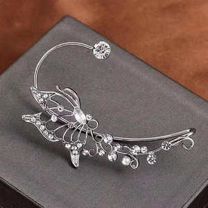 Elegant silver butterfly ear cuff with sparkling rhinestones and delicate tassel charms