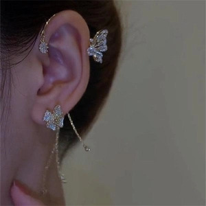 Elegant gold butterfly ear cuff set with tassel chains and sparkling cubic zirconia crystals