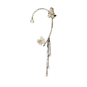 Elegant gold butterfly ear cuff with tassel chains and sparkling crystal accents