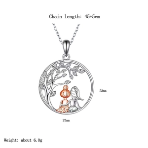 Detailed view of hollow tree of life pendant with two sisters and rose gold accents