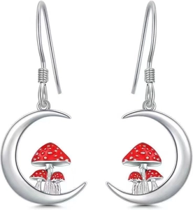 Close-up of S925 sterling silver crescent moon earrings with red mushroom enamel details