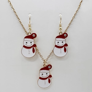 Detail of Christmas snowman necklace and earrings set with red and white enamel finish