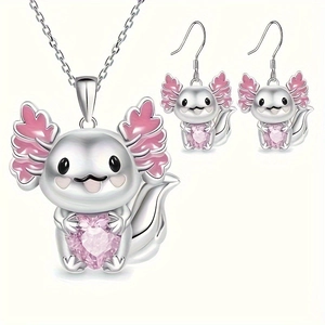 Detailed close-up of cartoon axolotl jewelry set with pink heart-shaped crystal