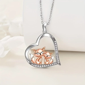 Fashionable heart pendant necklace featuring rose gold fox duo and sparkling crystals