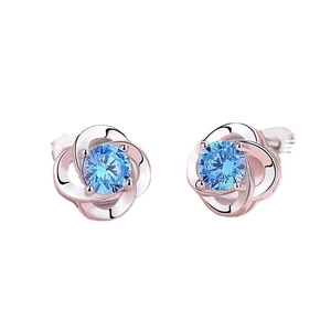 Elegant rose gold flower stud earrings with brilliant blue zircon stones for women