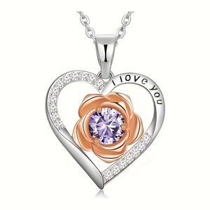 Detail of heart necklace with I love you engraving and purple birthstone rose