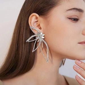 Exaggerated silver leaf flower stud earrings with sparkling crystals for elegant women