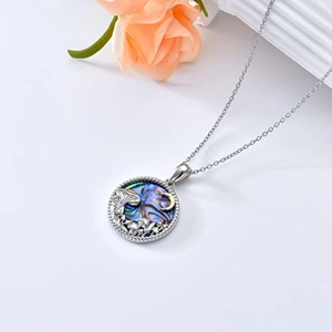 Vintage round pendant necklace with magic mushroom forest and crescent moon on shell inlay