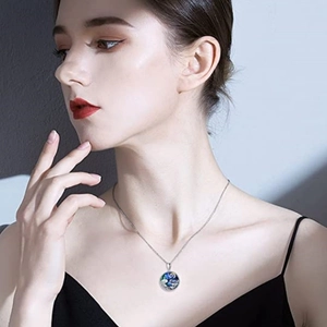 Artistic round pendant necklace with mushroom and moon painting on silver chain