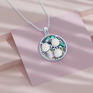 Elegante collar con colgante de tortuga redonda de plata con ópalo blanco y abulón