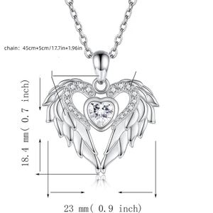 Macro shot of angel wing heart pendant showing precise 18.4mm dimensions and sparkling stones