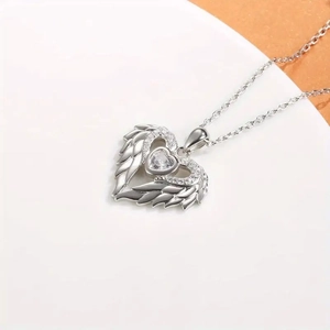 Classic silver heart angel wing pendant necklace with pavé diamonds and cubic zirconia