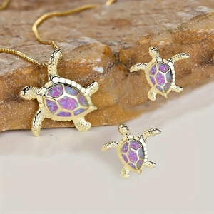 Schmuckset Schildkröte Gold mit lila Opal-Inlay inklusive Halskette und passende Ohrstecker