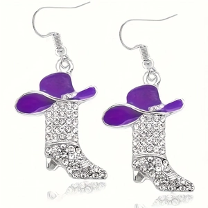 Sparkling western cowboy boot earrings with purple hat and rhinestones on white background