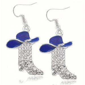 Detail of silver Western cowboy boot earrings with blue hat and sparkling rhinestones