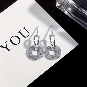 Elegant geometric interlocking circle drop earrings featuring sparkling zircon pavé finish